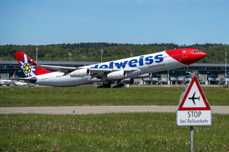 a large jetliner sitting on top of an airport runway