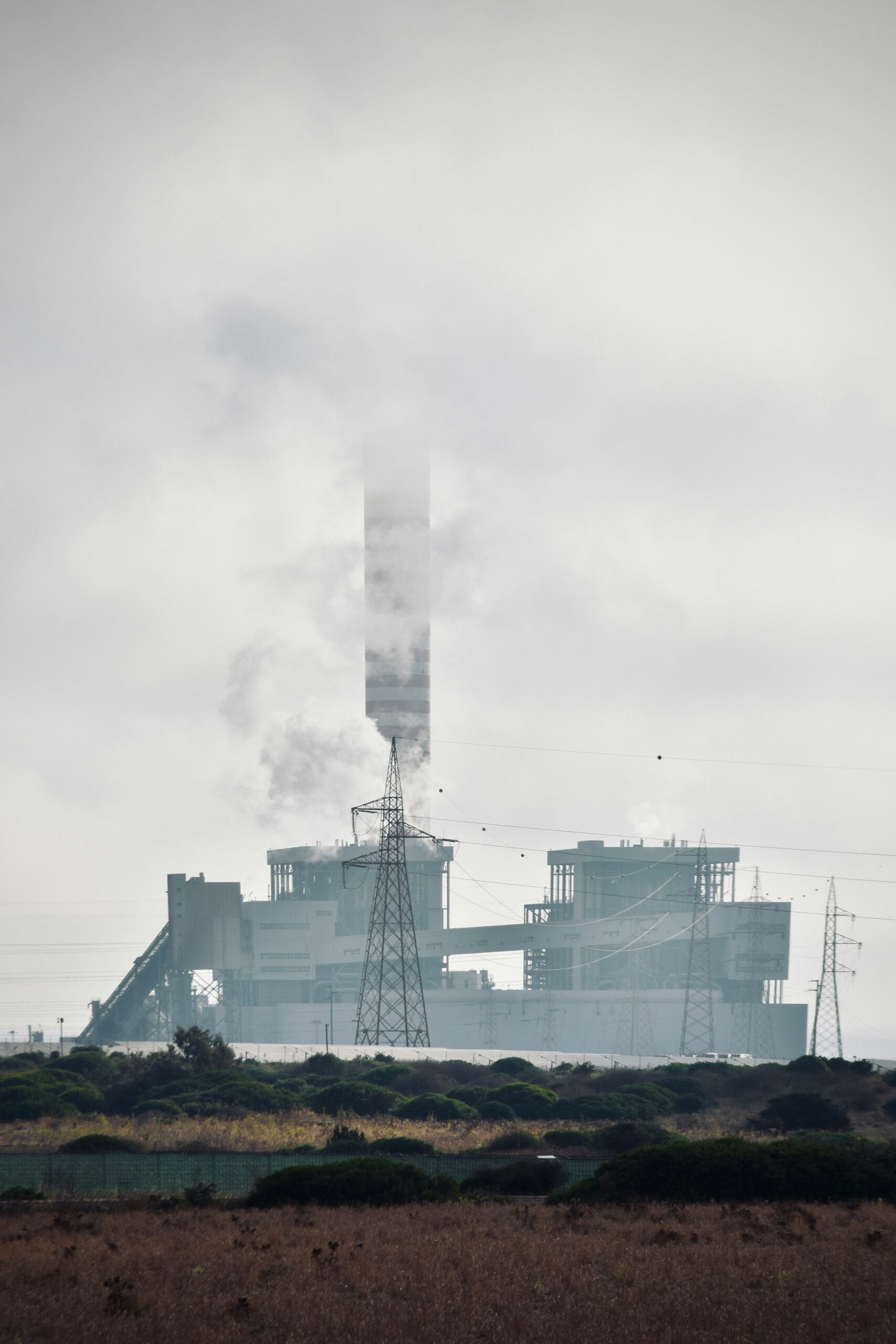 A factory with smoke coming out of it