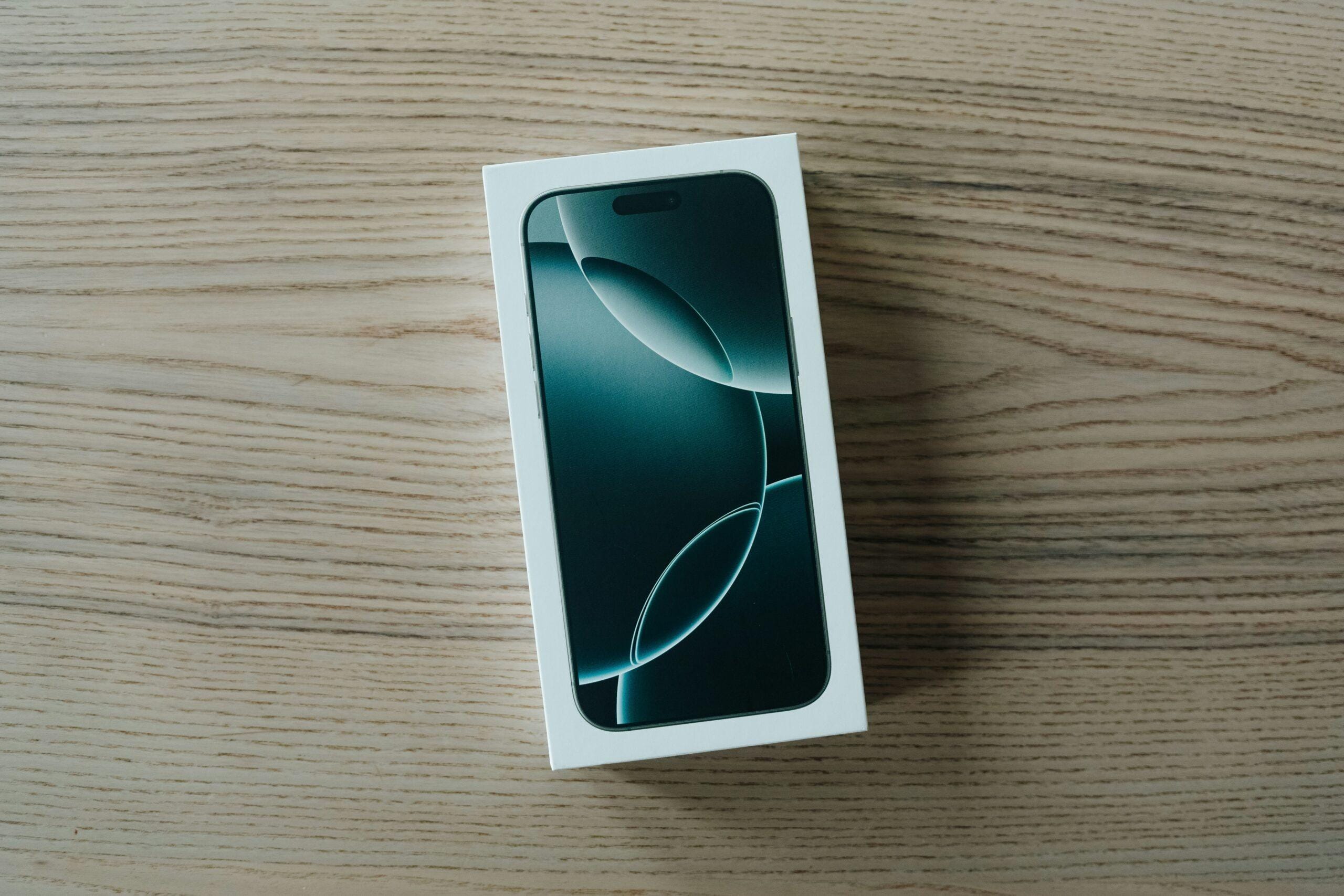 A white box sitting on top of a wooden table