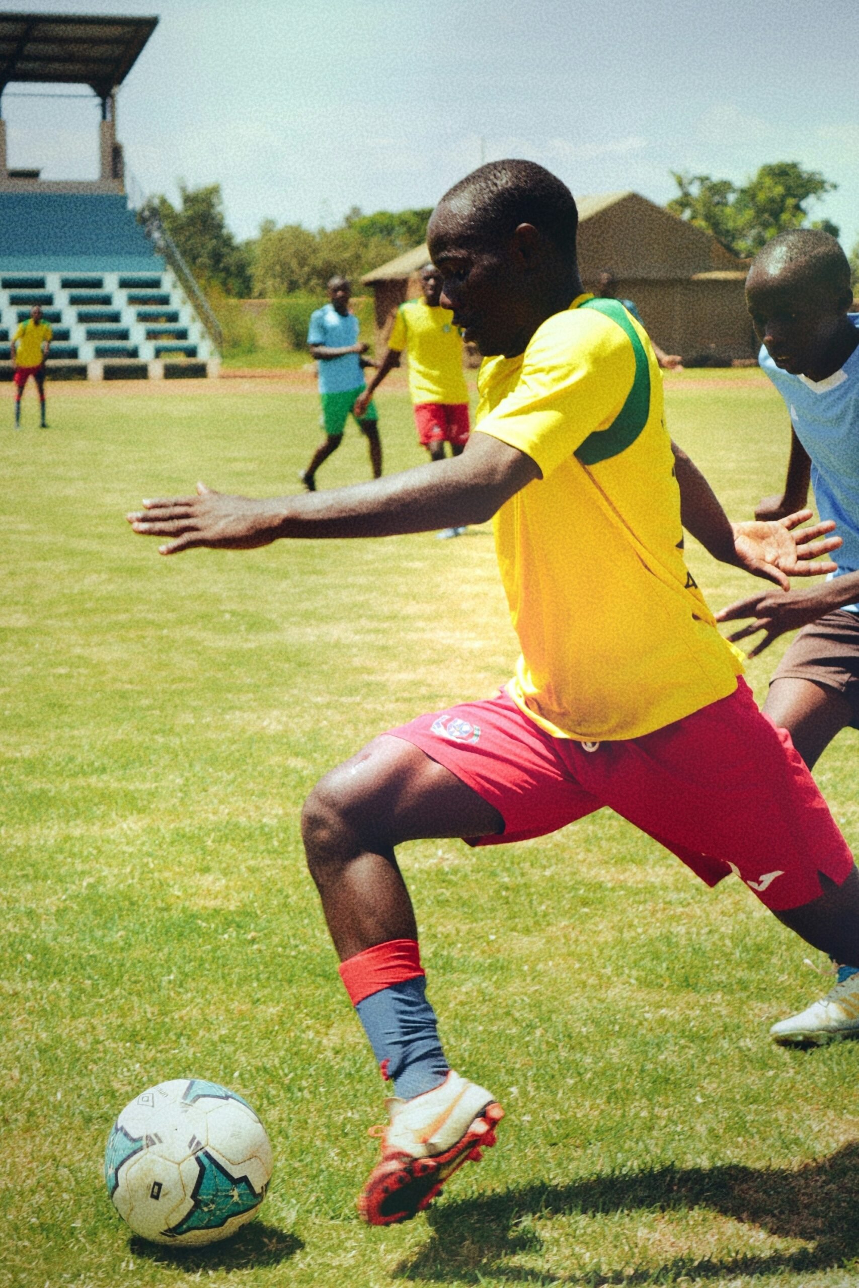 a group of young men playing a game of soccer