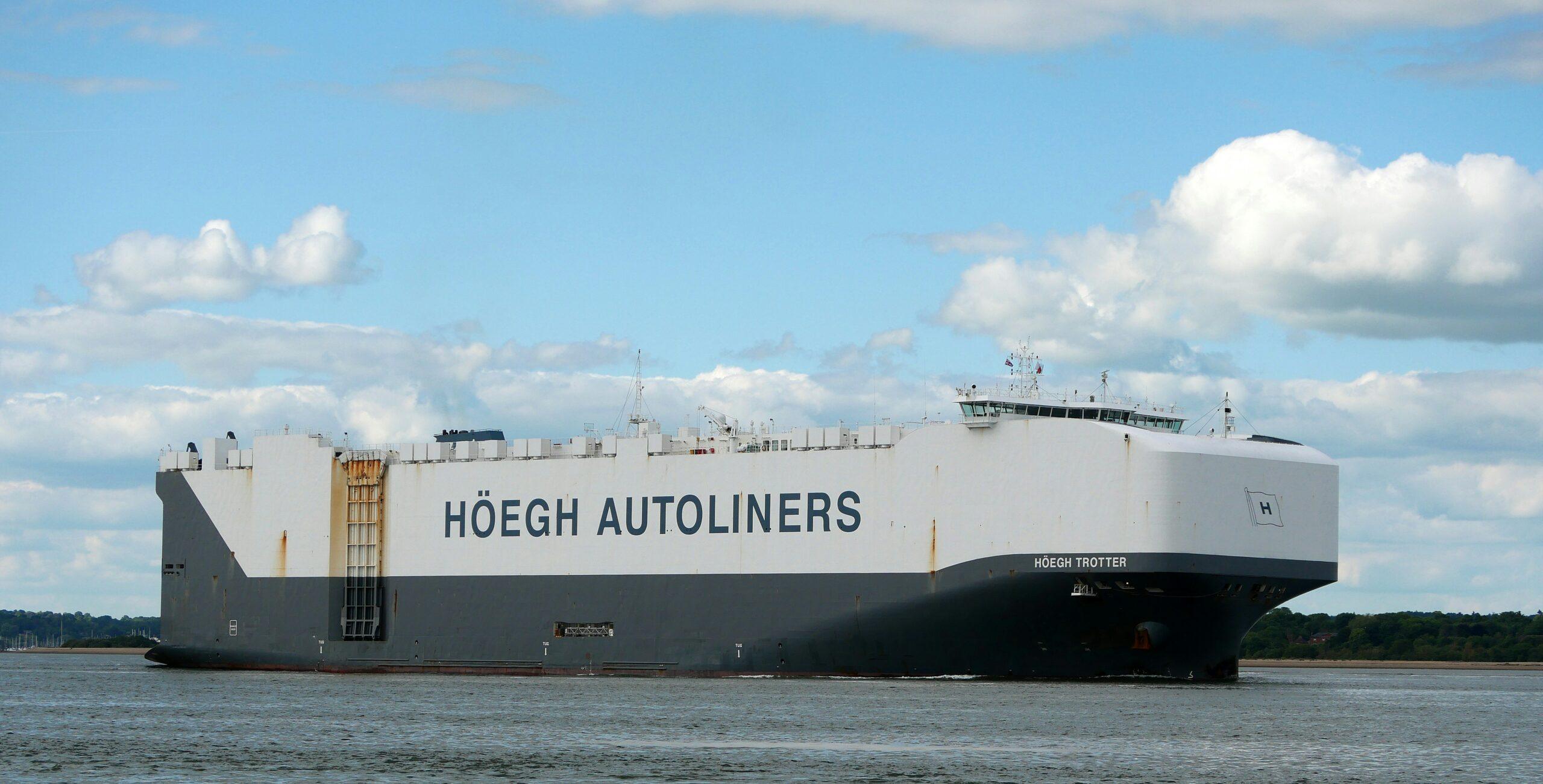 a large boat floating on top of a body of water