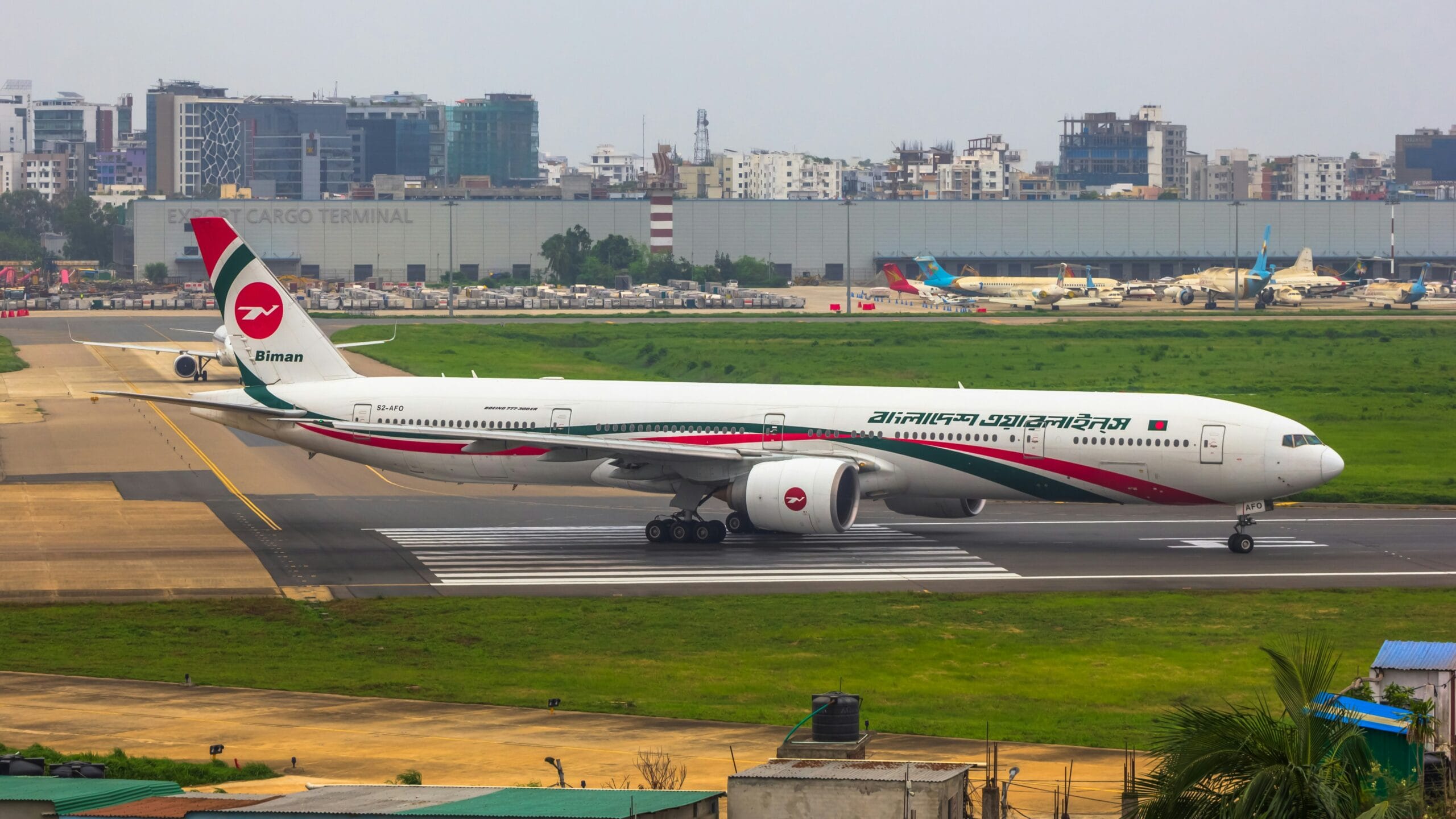 a large jetliner sitting on top of an airport runway