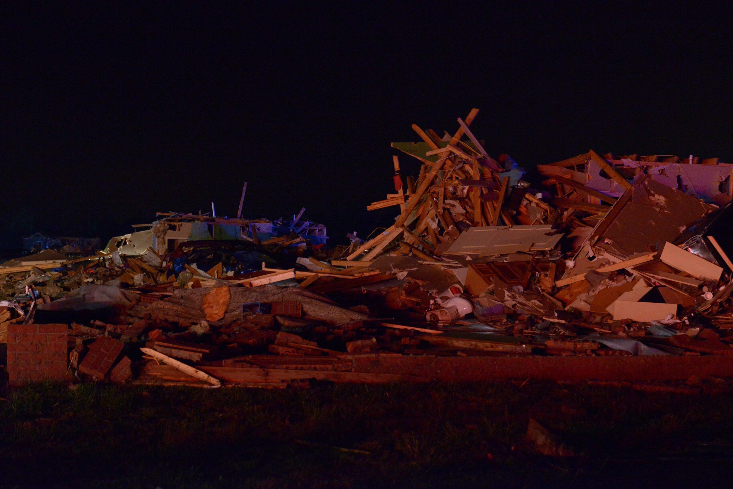 a pile of rubble sitting in the middle of a field