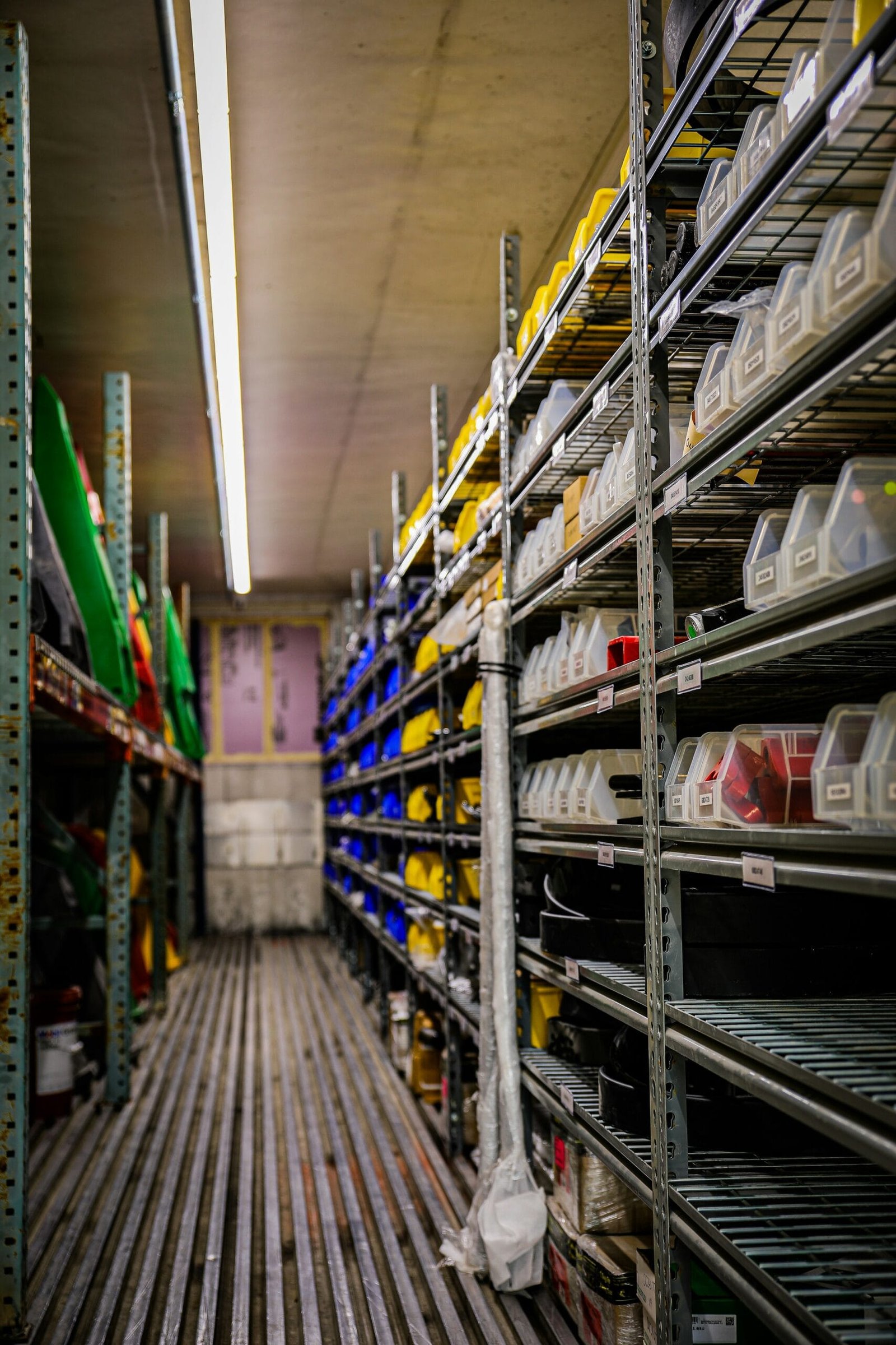 a room filled with lots of shelves filled with containers