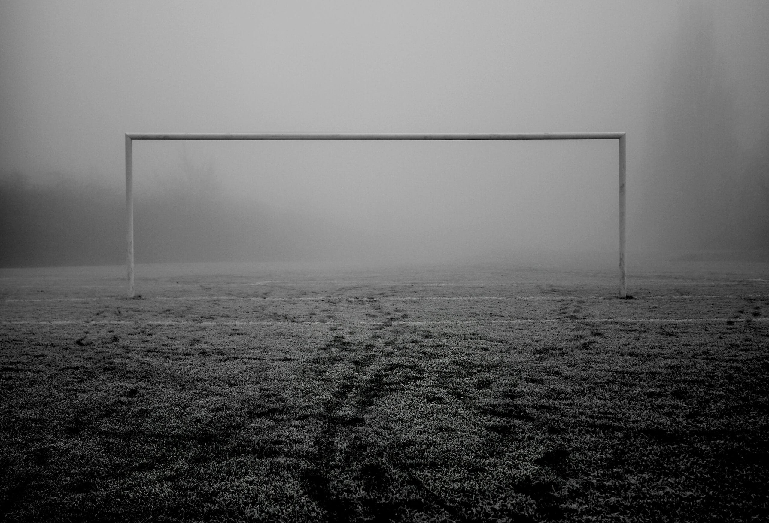 a soccer goal in the middle of a field