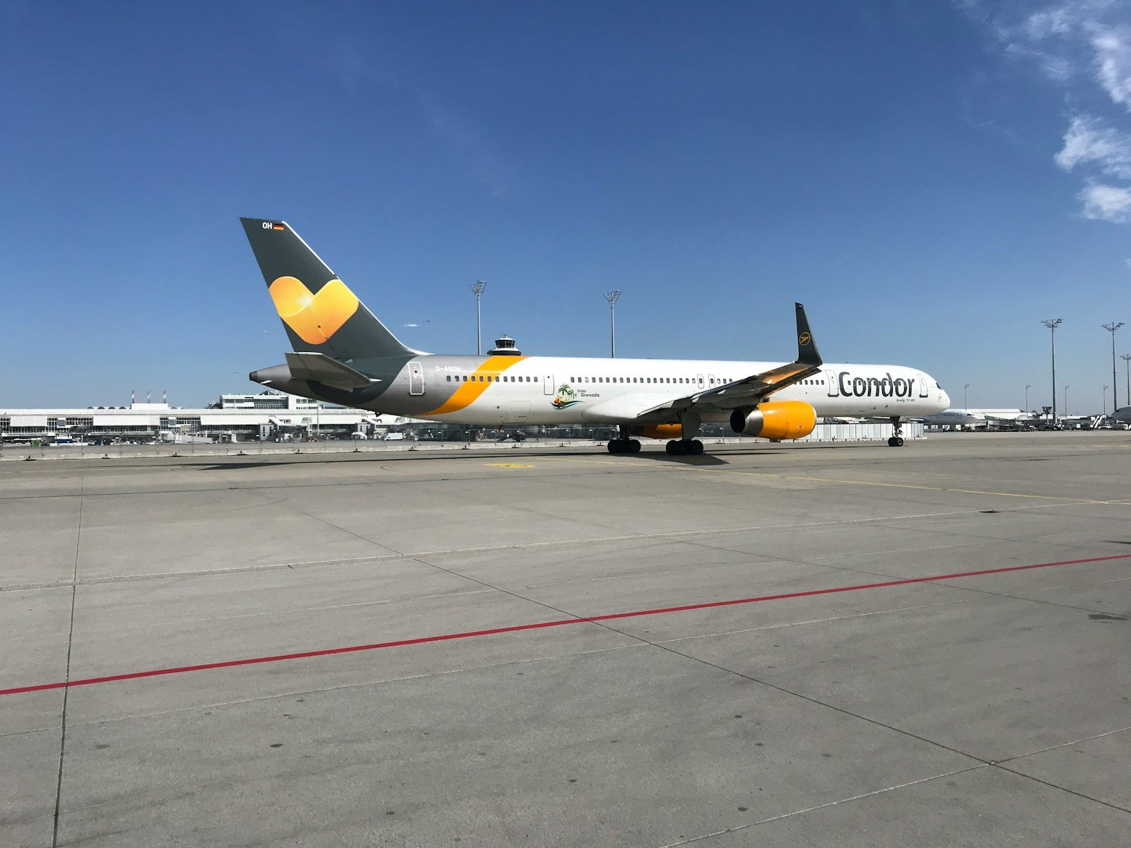 a large jetliner sitting on top of an airport tarmac