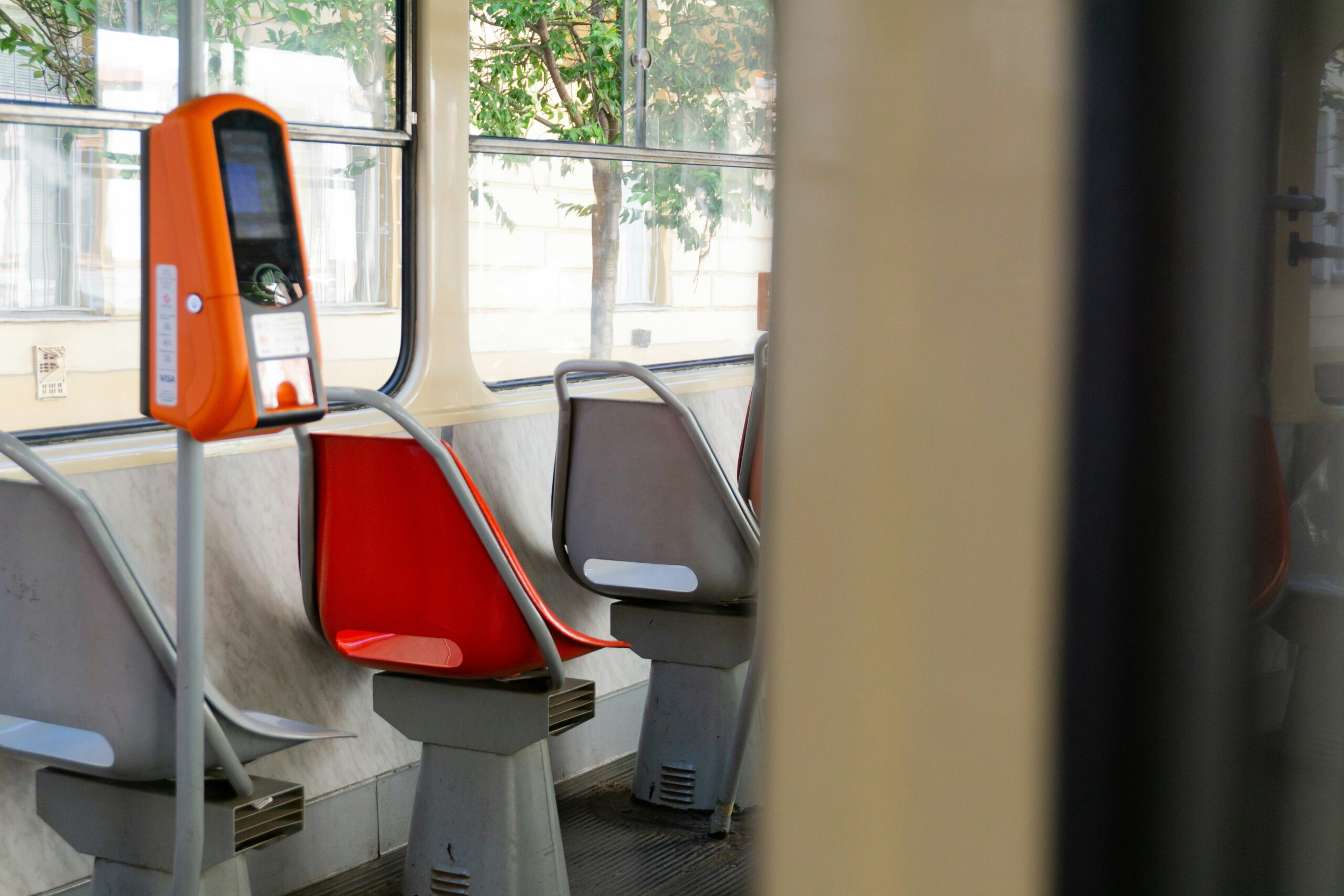 red and gray bus seat